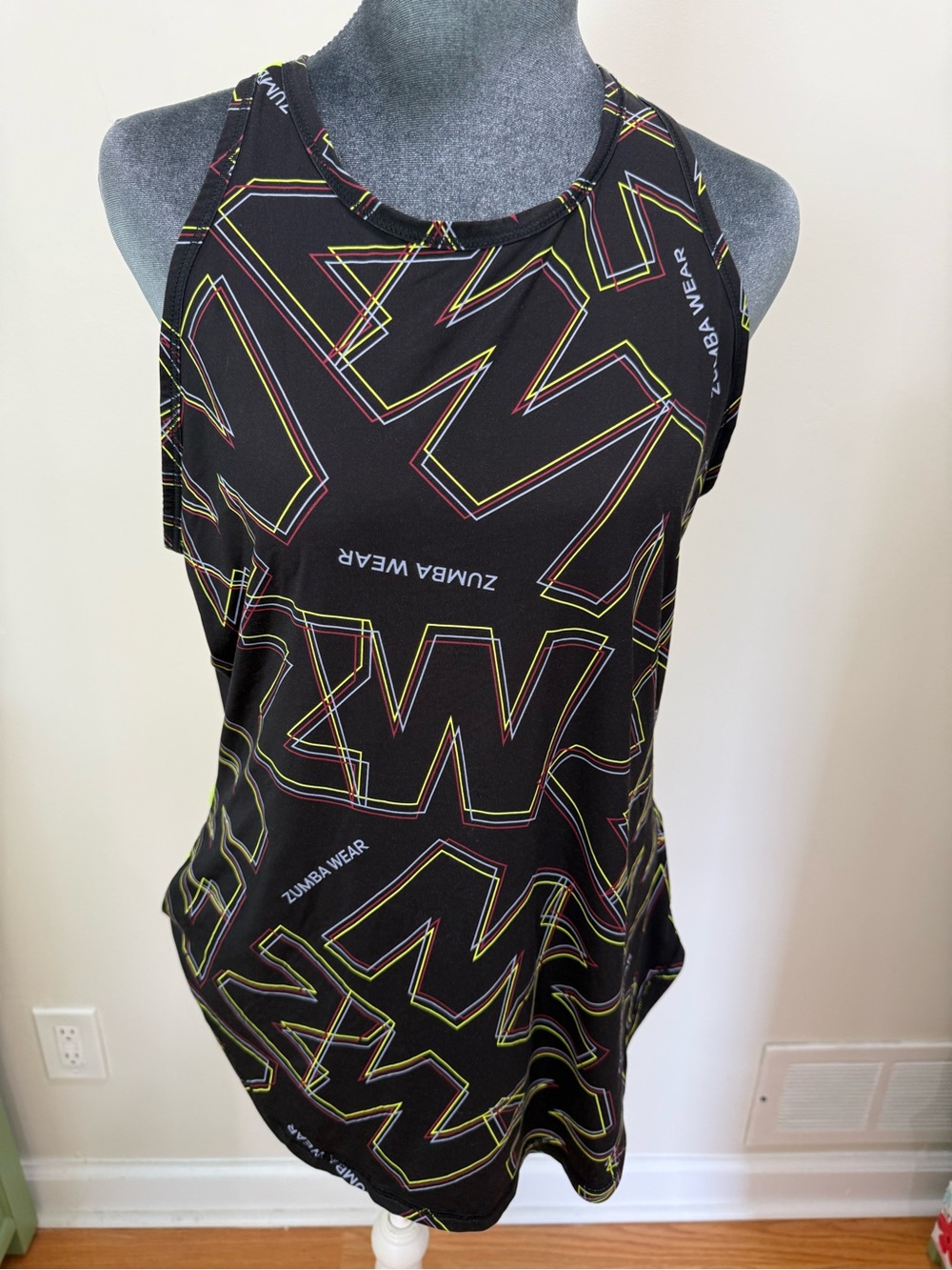 Zumba Fitness Neon Yellow Mesh Top with Black Trim and Multicolor Stripe Detail - Picture 3 of 13